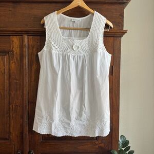 NorthStyle white sleeveless blouse with crochet yoke and embroidered hem